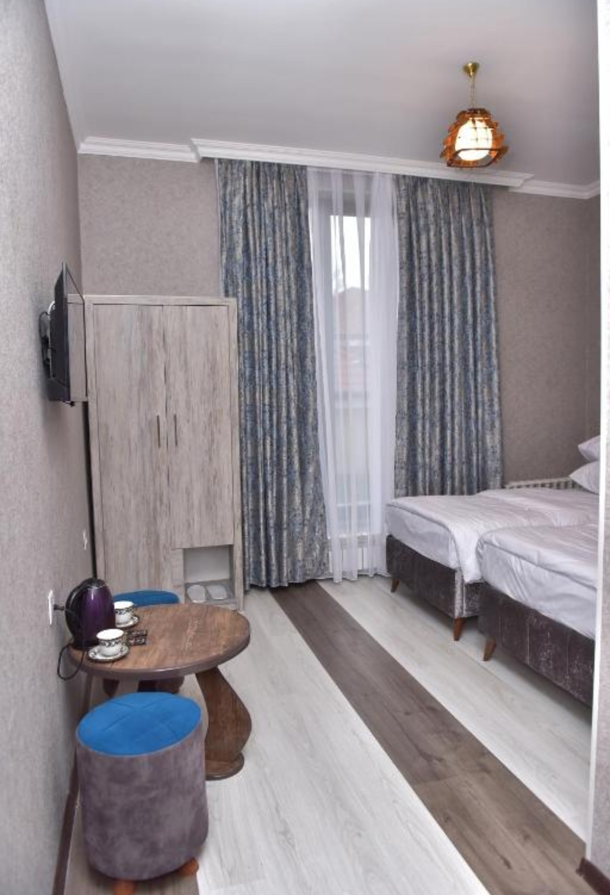  Photo of Economy Twin Room #1Photo of Economy Twin Room #2Photo of Economy Twin Room #3Photo of Eco