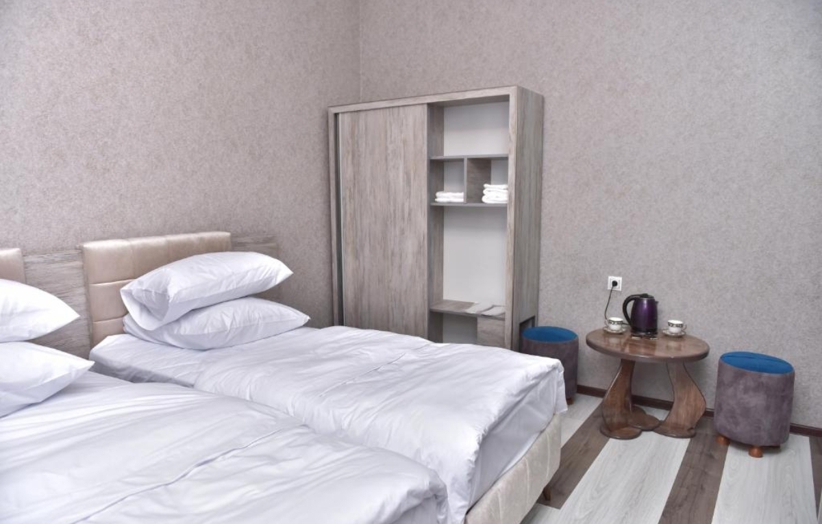  Photo of Economy Twin Room #1Photo of Economy Twin Room #2Photo of Economy Twin Room #3Photo of Eco
