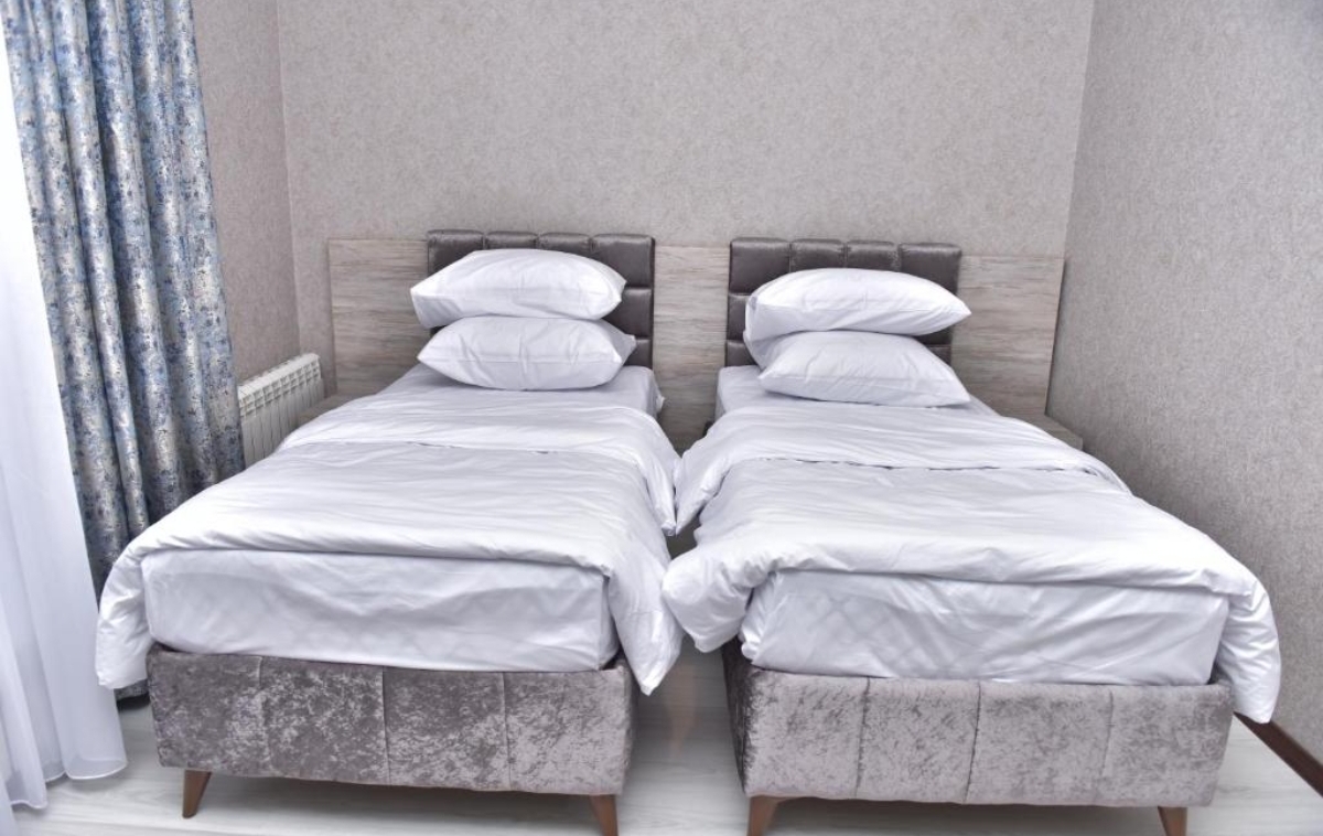  Photo of Economy Twin Room #1Photo of Economy Twin Room #2Photo of Economy Twin Room #3Photo of Eco
