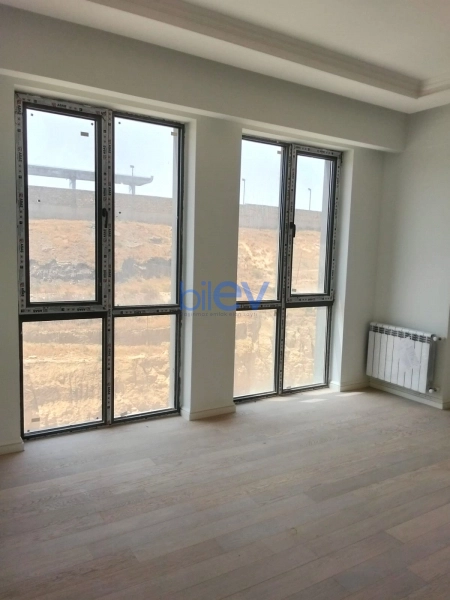 Satış 2 otaqlı Yeni Tikili bina evi  65m², Bakı